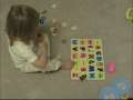 Toddler does Alphabet puzzle 