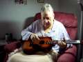Mom singing with learners guitar