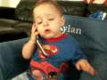 Kylan on the phone with daddy! 