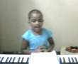 My daughter Aradhona is singing an English song.The song is&quot;Here I am to worship&quot;
