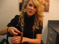 Taylor Swift teaches how to put on a bracelet...Funny! 