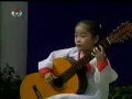 Little North Korean Girl Playing Guitar 