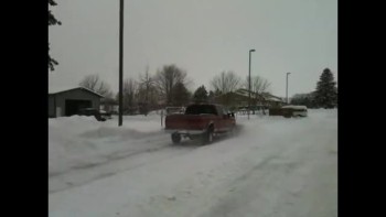 Stuart snowplowing church lot