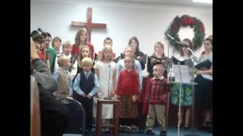 Christmas performance at Bible Baptist Church, Anderson, SC. Three of the children on stage.