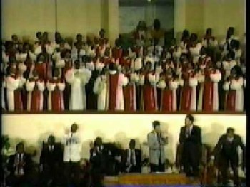 the late Phillip Britton directing the Greater St Stephen Mass Choir in 1991 pt 1 