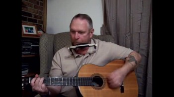 Resurrection Blues, written and by performed by Preacher man Don, aka Blind Dog 