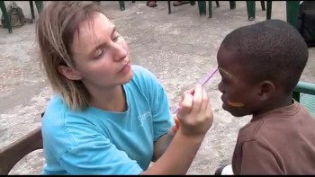 Crewmembers from Logos Hope organise and carry out a visit to a nearby orphanage.