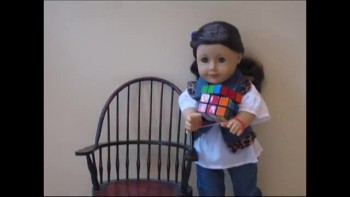 American Girl Doll Solves Rubicks CUBE in SECONDS!! 