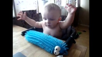 Adorable Baby Is Scared of Toy 