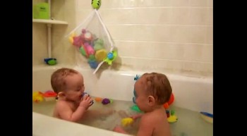 Twins Make Each Other Laugh In Tub 