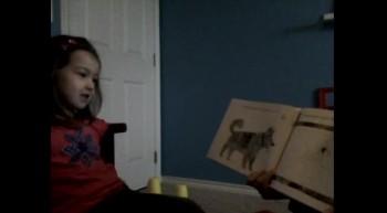 Madeline Reading Her Spider Book 