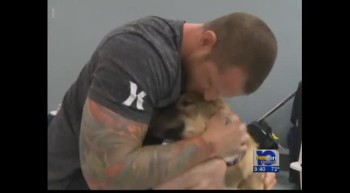 US soldier reunited with dog he rescued 