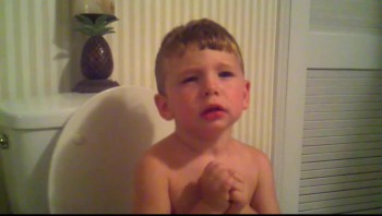 Adorable!  Father and Son Pray for potty time 