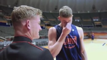 College Basketball Player's Emotional Reunion with Beloved Marine Brother 
