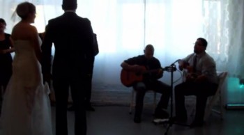 My daughter and her friends surprise groom by singing the <br />Spanish song Quiere Me at their wedding.