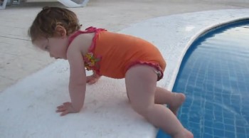 This Baby's Hilarious Attempt to Get in Pool Will Make You Smile! 