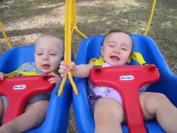 These Happy Twins Giggling on a Swing Will Make You Smile! 