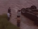 After a truck carrying children hydroplaned and ended up turned over in a river, heroes that witnessed it sprung into action.  Watch these quick-thinking heroes miraculously rescue these children before they drowned.  Truly a God thing!