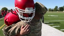 After singing the National Anthem at his football game, this soldier's son was in for an even more patriotic surprise! Seeing his father in uniform walking towards him down the field was enough to bring a tear to any football team's biggest lineman.