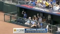 A US Airman pulls a double surprise on his unsuspecting girlfriend asking for her hand in marriage on Memorial Day 2013 at a Kansas City Royals baseball game.