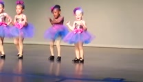 3-year old steals the show (and your heart) during a dance recital.
