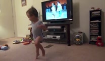 Toddler Learns to Swing Dance While Watc image pic