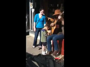 Blind Boy With Autism Stops to Have an Incredible Moment With a Street Performer