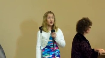 9 year old sings 'Up to the Mountain'  