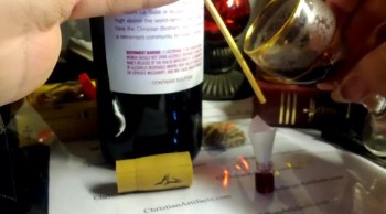 Sacramental Wine poured into tiny bottles [ChristianArtifacts.com] 