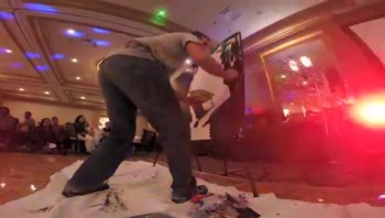 Painted Christ Lance Brown performs his Upside Down Jesus Painting at a wedding reception in Galveston Texas. For more information and booking please visit:<br /><br />http://www.paintedchrist.com<br />http://www.facebook.com/paintedchrist