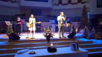 Worship Pastor Cory Stanley and Aloma Baptist Church's praise team  leads the congregation in singing "Come Thou Long Expected Jesus" during Christmas Eve service this evening.  Aloma continues to worship the Lord.