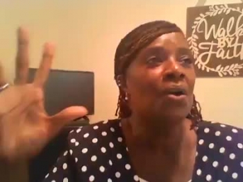 Evangelist CJ singing: "In the Cleft of the Rock"