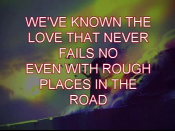 This songs depicts two individuals who were separated at one point out of a misunderstanding but now face persecution for their faith.Now back against the wall they discover they were meant for one another and they go out with a smile and love in their hearts for one another