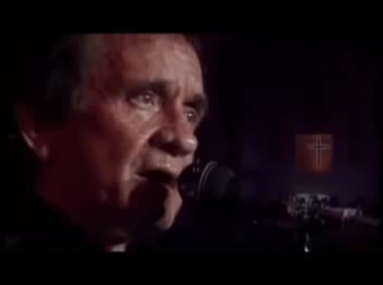 Johnny Cash singing man in white