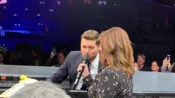 Michael Buble noticed a sign that a group of 6th graders made for their teacher, Mrs. Diana Fairbanks. Michael Bublé noticed the poster, signed it, and Mrs. Fairbanks got the chance of a lifetime to sing “A Whole New World”<br /> with him thanks to the poster her students made her. SEE LINK FOR FULL VIDEO; and see what was caught Michael Buble’s eye about the sign,<br />https://youtu.be/qDsAMMuCKOM