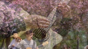 string quartet and guitar play gospel