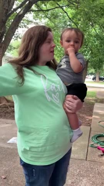 My 11th baby nephew lifting his hands and praising and worshiping Jesus to the song The Blessing. 