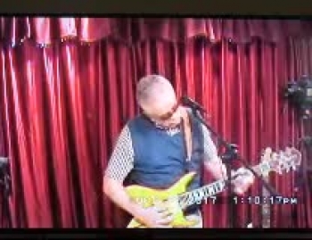 Bill playing the guitar & singing