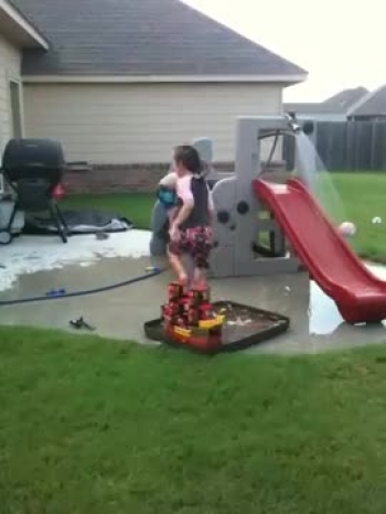 Kayli and her younger brother are having fun in the water.