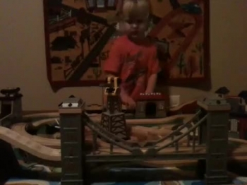 Hudson is so proud of his train setup that he wants to show it off.