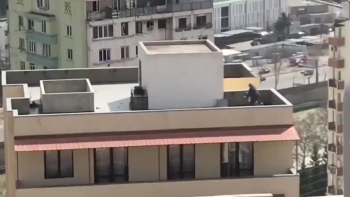 Bicycle on the roof of the house