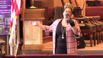 Lady sings a song to God