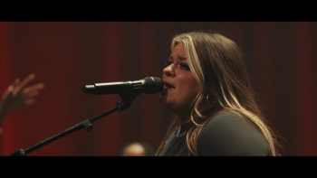 <p>Do you want to join in on a sweet worship experience? Check out this video of a live performance of Anna Golden - Glory to Glory.</p>

<p>As the band begins to play, a group of worship leaders are on the stage standing in reverence and praise to our God. A woman with a precious countenance and an even sweeter voice begins to sing. Anna leads in a song of adoration to the Lord. She asks God to take us higher.&nbsp;</p>

<p>These lyrics are an anthem to motivate our hearts and lives that God is still working and His Spirit is still moving. We are invited to call on Him and ask for a fresh revival to see Him work and move through us.&nbsp;</p>

<p>This melody line gets everyone singing along with them to this catchy fresh worship song. Anna and the band are reminding us that there is more than this world has to offer, we have the kingdom of Heaven in our hearts and a future hope of heaven.&nbsp;</p>

<p>The chorus sings:</p>

<p>There is better There is greater<br />
We go from glory to glory<br />
Take us higher Take us deeper<br />
We go from glory to glory</p>

<p>The bridge encourages us that the Lord has no limits to what He can do. When we surrender our lives and our callings to the Savior, He can work in miraculous and wonderful ways. He is always moving and working up His greater plan, but His invitation is for us to follow Him and be a part of His gospel work.&nbsp;</p>

<p>As you join in with this song of praise today, be motivated that the Lord is not finished with you and He has much more in store for those who love Him.</p>

<p><em>&ldquo;But we all, with open face beholding as in a glass the glory of the Lord, are changed into the same image from glory to glory, even as by the Spirit of the Lord.&rdquo; <a href="https://www.godtube.com/bible/2-Corinthians/3-18">2 Corinthians 3:18</a></em></p>
