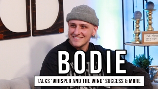 Join us for an exclusive interview with bodie at the GodTube Music Studio in Nashville, TN, where he shares the incredible journey behind his hit single "Whisper and the Wind", the exciting new version featuring Gracie Binion, and what&rsquo;s coming soon from him. As the runner-up on Season 22 of The Voice, bodie has quickly become a standout in the alt-pop and Christian music scene. His powerful single "Whisper and the Wind" from his debut EP, HAPPY TO BE HERE (Provident Entertainment/SONY), is currently streaming over 400,000 times weekly!