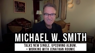 <p>Michael W. Smith talks about his new single, &lsquo;Arms Around The Sun&rsquo; featuring &lsquo;The Chosen&rsquo;s&rsquo; Jonathon Roumie. Sometimes a moment in music feels like joy you could bottle &mdash; and that&rsquo;s precisely what happened when our favorite singer dropped his new single that will have you dancing. And get this: Jonathan Roumie, the guy who plays Jesus on &lsquo;The Chosen,&rsquo; played drums on the track. Yes, you read that right &mdash; Jesus on the kit.</p>

<p>This whole collaboration wasn&rsquo;t even planned. Jonathan <a href="https://www.instagram.com/p/DITyAXLxrH0/?img_index=1">posted</a> on Instagram, &ldquo;I couldn&rsquo;t be more honored to get to play with the legend himself&hellip; This all happened kinda spontaneously (I maintain I was &lsquo;tricked&rsquo; into this recording by Tedd and Michael 😂).&rdquo; You can feel how much it meant to him, like a dream God kept tucked away until the right time.</p>

<p>Michael confirmed it, he said, &nbsp;&ldquo;He was a little nervous&hellip; We did probably three or four passes of it, and he just killed it. He just knocked it out of the park.&rdquo;</p>

<p>You can hear the fun, the freedom, the fingerprints of Heaven in the beat. And what&rsquo;s even more beautiful is that you can feel Michael&rsquo;s heart behind it all. He&rsquo;s not chasing charts or trying to fit in. &ldquo;I write what I feel led to do,&rdquo; he <a href="https://www.movieguide.org/news-articles/jonathan-roumie-featured-on-michael-w-smiths-newest-single.html">said</a>. &ldquo;It&rsquo;s tempting &mdash; you want to compete &mdash; but you just can&rsquo;t go there.&rdquo; He cares deeply about his music, about the people who listen, and about what God thinks.</p>

<p>&ldquo;It took 63 mixes to get the mix right,&rdquo; Michael laughed, &ldquo;but you know what, hey, if it was easy everybody would do it.&rdquo; He added, &ldquo;I listened to it this morning on my walk&hellip; just to make sure it still sounded as good as I thought it did.&rdquo;</p>

<p>That kind of care? That kind of passion? It shows.</p>

<p>Watching Jonathan live out an old dream and seeing Michael light up like a kid with a new toy &mdash; it just feels like God smiling through melody. It&rsquo;s not just another worship track; it&rsquo;s an upbeat song with an 80s vibe. It&rsquo;s an echo of something eternal, with arms wide open around the sun and the soul. And honestly? It&rsquo;s worth hitting play more than once.</p>

<p><em>&ldquo;Great is the Lord and most worthy of praise; his greatness no one can fathom.&rdquo; <strong><a href="https://www.godtube.com/bible/psalms/145-3">Psalm 145:3</a></strong></em></p>
