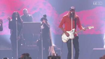 <p>There&rsquo;s something sacred and spunky when heaven meets a banjo and a beat drops in the middle of a laundry pile. And let me just say&mdash;Crowder at the Dove Awards? Electric. From the first stomp of the beat to the last hallelujah note, this performance of Crowder&rsquo;s electrifying Live &lsquo;Grave Robber&rsquo; will have you praising with a grin so wide your cheeks hurt.</p>

<p>Crowder, a wild-bearded and bold worshiper, turned the stage into a joy explosion, and we&rsquo;re still not over it. I mean, who knew a resurrection anthem could double as your go-to soundtrack for scrubbing the stovetop or chasing toddlers with peanut butter hands? But that&rsquo;s the thing about &lsquo;Grave Robber&rsquo;&mdash;it&rsquo;s got grit and glory, joy and Jesus all bundled up in a toe-tapping, soul-shouting celebration.</p>

<p>This isn&rsquo;t just another performance. No, this was a full-on pep rally for the One who rolled the stone away. In the video, the entire room pulsed with life, the kind only a risen Savior can give. The drums pounded like a heartbeat, the guitars wailed like freedom, and Crowder&rsquo;s unmistakable voice carried words that reached right into your ordinary and reminded you: you&rsquo;ve been raised, redeemed, and rerouted straight into the arms of grace.</p>

<p>It&rsquo;s the kind of song that makes folding three loads of towels feel like a revival. It belongs on your &lsquo;Conquer the Chores' playlist right next to &lsquo;Good God Almighty&rsquo; and that other Crowder banger you secretly sing into your broom handle. Whether you're mowing the lawn, mopping the floor, or trying to survive that Monday morning commute, this music video is your invitation to praise your way through it.</p>

<p>So maybe today you&rsquo;ve got a mountain of laundry and a sink full of dishes. Or maybe your soul just needs a little lift. Put this one on. Turn it up. Thank the Lord who robbed your grave and gave you this breath. And then dance your way through the dishes, friend.</p>

<p>Because joy looks good on you.<br />
And worship? It was made for the wild and the wonderfully ordinary.</p>

<p>We hope you loved every electrifying, holy-rolling, goosebump-inducing second of this fabulous Grave Robbing moment.</p>

<p>Now go on&mdash;press play again. Your mop is waiting.</p>

<p><em><strong><a href="https://www.godtube.com/bible/romans/8-11">Romans 8:11</a></strong> &ldquo;And if the Spirit of him who raised Jesus from the dead is living in you, he who raised Christ from the dead will also give life to your mortal bodies because of his Spirit who lives in you.&rdquo;</em></p>
