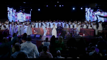 Listen to Ron Carter's "Farther Along."