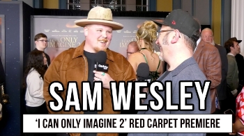 Sam Wesley, the son of MercyMe frontman Bart Millard and a central figure in I Can Only Imagine 2, spoke with Brandon Woolum on the red carpet about the surreal experience of seeing his personal story brought to life on screen. Sam admitted he initially laughed when his dad told him they wanted to make a movie that included his own struggles, but the reality set in when he received the script and realized their family’s journey would be shared with the world. He called it both an honor and a privilege, especially as audiences begin to connect with the film’s honest portrayal of pain, faith, and perseverance.

Wesley emphasized the importance of vulnerability, saying the film does not sugarcoat the difficult moments but instead tells the full truth so others can feel seen and understood in their own struggles. Beyond the premiere, Sam is also stepping into his own spotlight, preparing for his Grand Ole Opry debut and an upcoming arena tour with MercyMe and Tim Timmons. With new music on the horizon and his story now inspiring audiences nationwide, Sam described this season as both overwhelming and deeply meaningful.