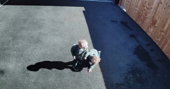 <p>Twin brother being helped by his twin to stand up without any prompt.</p><p><br></p>
