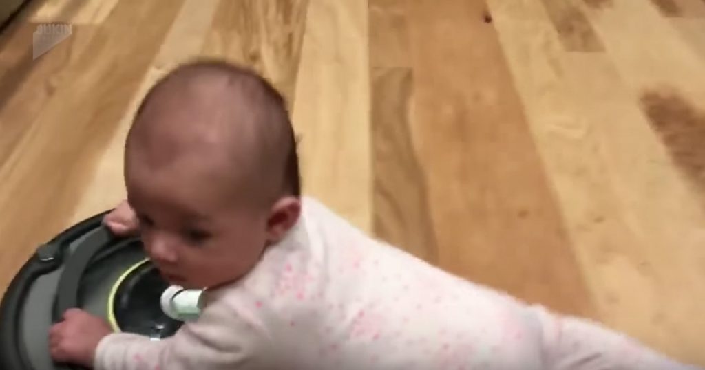 Baby Hilariously Hitches A Ride On A Roomba